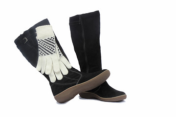 Image showing Black womens winter boots and white gloves.