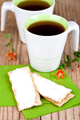 Image showing tea and crackers with cream cheese