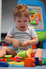 Image showing A baby boy crying in children's room