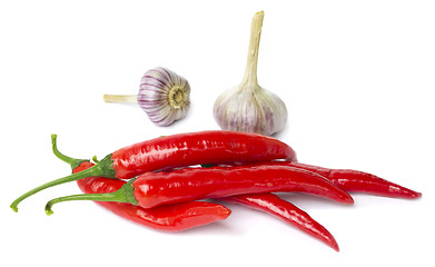 Image showing Red pepper and garlic on white