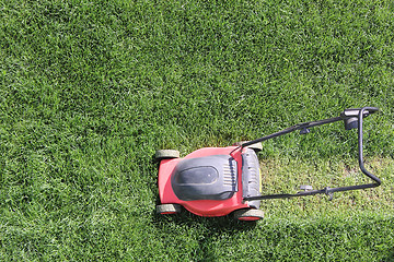 Image showing Grass cutter at the lawn