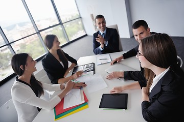 Image showing business people in a meeting at office