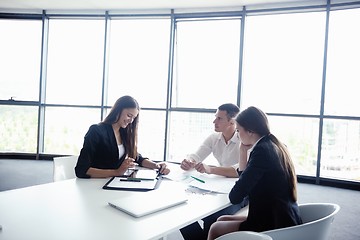 Image showing business people in a meeting at office