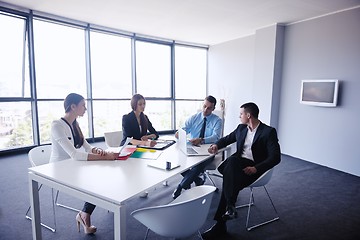 Image showing business people in a meeting at office