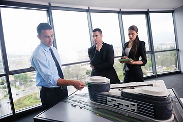 Image showing business people in a meeting at office