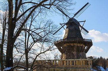 Image showing Winter landscape with traditional old windmill