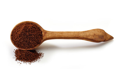 Image showing wooden scoop with ground coffee