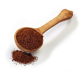 Image showing wooden scoop with ground coffee