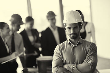 Image showing business people and engineers on meeting