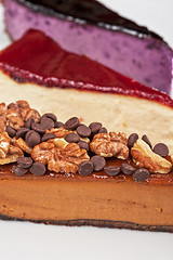 Image showing cheesecake with chocolate and nuts