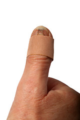 Image showing Band-aid at thumb