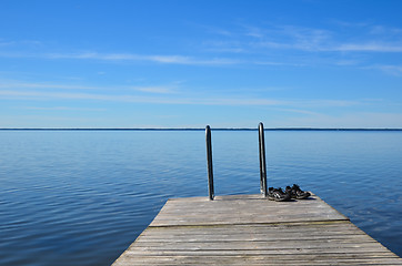 Image showing Shoes on old jetty