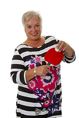 Image showing Sporty female senior with ping pong paddle