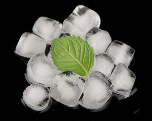 Image showing Ice cubes isolated on black