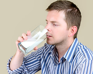 Image showing Drinking milk