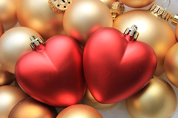 Image showing red heart shaped christmas ornaments