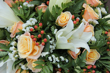 Image showing Roses and lillies in a bridal arrangement