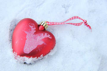 Image showing Heart shaped ornament in the snow