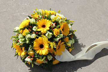 Image showing Yellow sympathy flowers