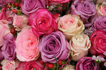 Image showing purple and pink roses wedding arrangement