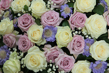 Image showing Purple and white wedding roses