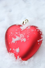 Image showing Heart shaped ornament in the snow