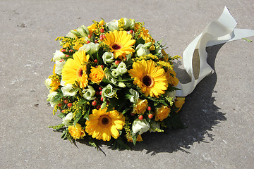 Image showing Yellow sympathy flowers