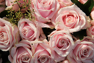 Image showing Pink roses in a wedding centerpiece