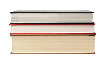 Image showing Fore edge of stack of three books