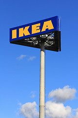 Image showing IKEA  Sign against Blue Sky with Some Clouds