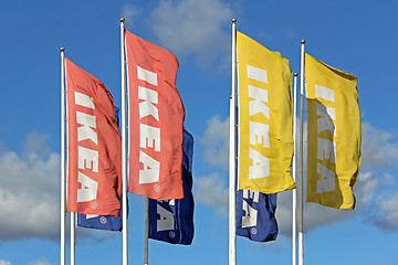 Image showing Group of IKEA Flags against Sky