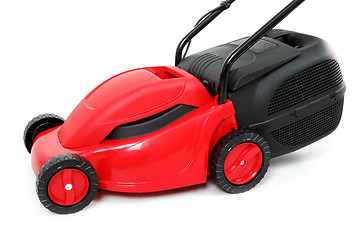 Image showing new red lawnmower on white background