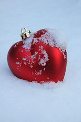 Image showing Heart shaped ornament in the snow