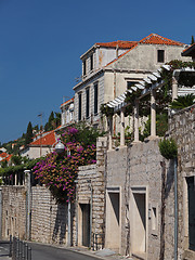 Image showing White stone and orange tiles mediterranean building on an hillsi