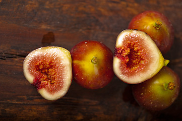 Image showing fresh figs over old wood