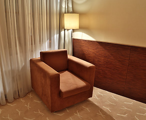 Image showing brown armchair and floor lamp