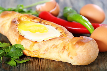 Image showing Pie with cheese and egg. Georgian cuisine.