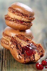 Image showing Almond cake with chocolate filling and berries.