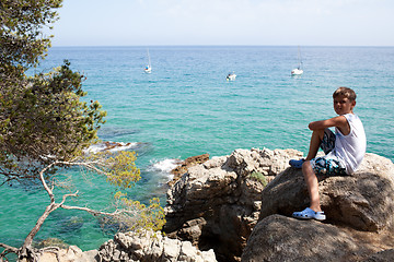 Image showing Young boy and beautiful Mediterranean seascape