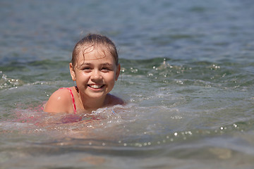 Image showing Young girl in the sea