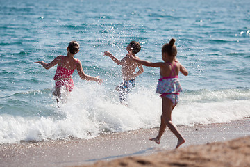 Image showing Happy children and sea
