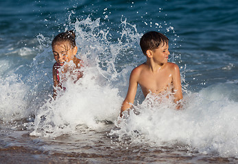 Image showing Happy children and sea