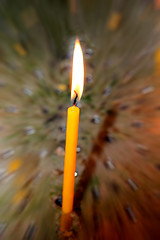 Image showing Candle burning in darkness