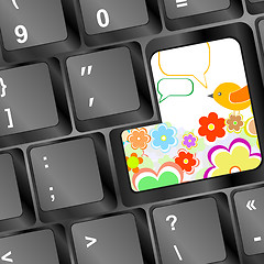 Image showing Modern keyboard button, flower and bird