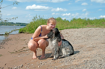 Image showing Girl and dog.