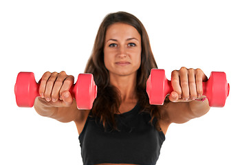 Image showing Weights in the hands of a young woman