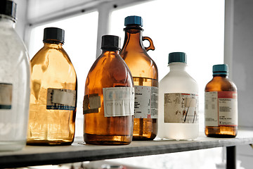 Image showing Old laboratory with a lot of bottles