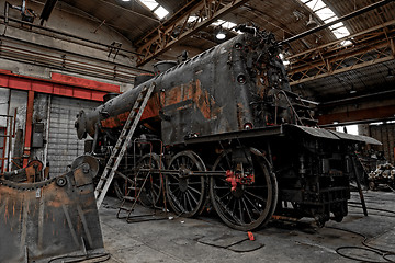 Image showing Old industrial locomotive in the garage