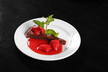 Image showing Chocolate cake wth strawberry and chili