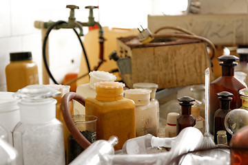 Image showing Old laboratory with a lot of bottles